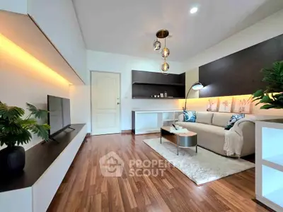 Modern living room with stylish decor and wooden flooring