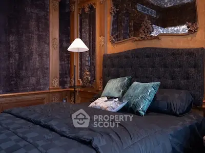 Luxurious bedroom with elegant decor and plush bedding