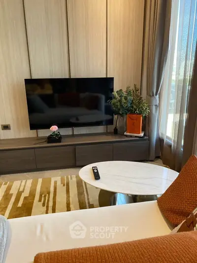Modern living room with sleek TV setup and stylish decor