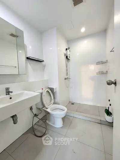 Modern bathroom with sleek fixtures and walk-in shower