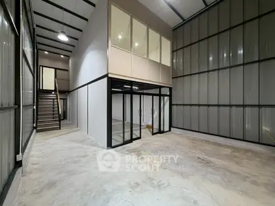 Spacious industrial warehouse with mezzanine office and high ceilings