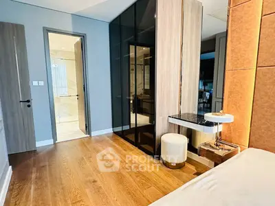 Luxurious modern bedroom with elegant decor and wooden flooring