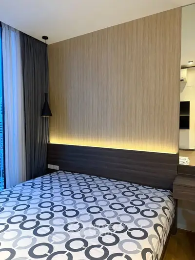 Modern bedroom with stylish lighting and city view