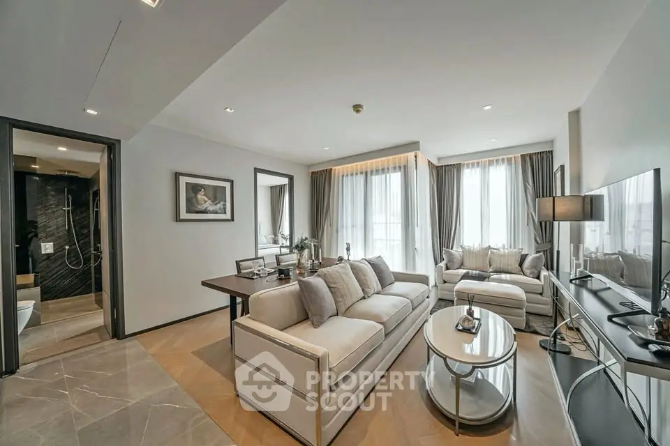 Luxurious modern living room with elegant decor and ample natural light