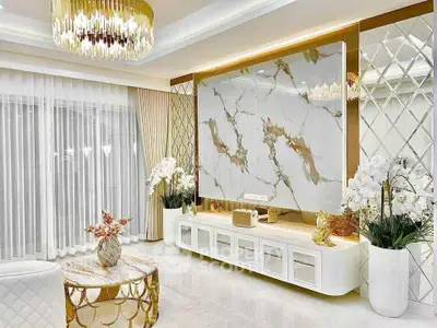Luxurious living room with marble accents and elegant chandelier