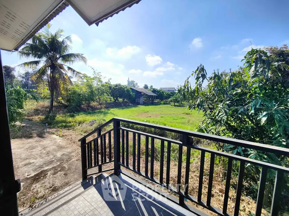 Charming rural property with lush greenery and spacious outdoor area, perfect for nature lovers.