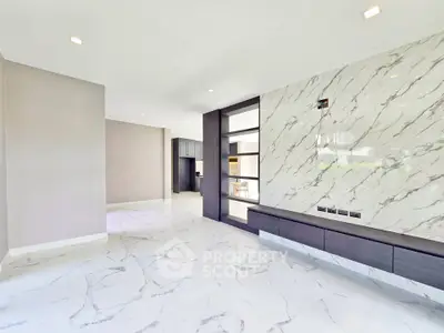 Luxurious modern living room with marble accents and open layout