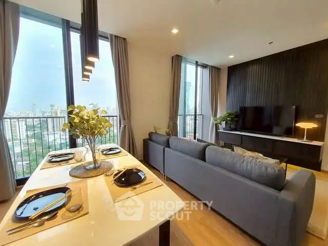Modern living room with city view, stylish decor, and dining area.