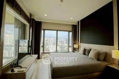 Luxurious bedroom with panoramic city view and modern decor