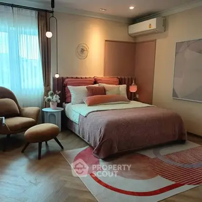 Cozy bedroom with modern decor and stylish lighting