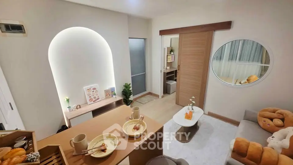 Cozy modern living room with stylish decor and warm lighting