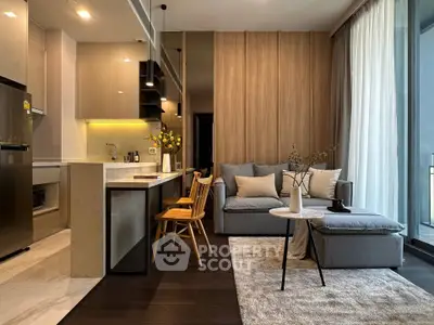 Modern open-layout living room with stylish kitchen and cozy seating area, featuring floor-to-ceiling windows and elegant decor.