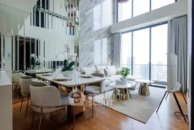 Luxurious modern living room with high ceilings and elegant decor