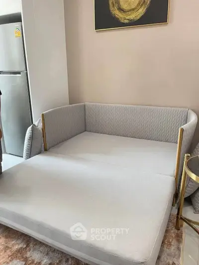 Modern living room with stylish gray sofa and elegant decor