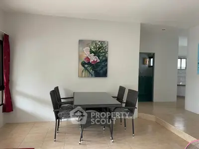 Spacious dining area with elegant decor and natural lighting