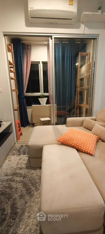 Cozy living room with modern decor and large sectional sofa