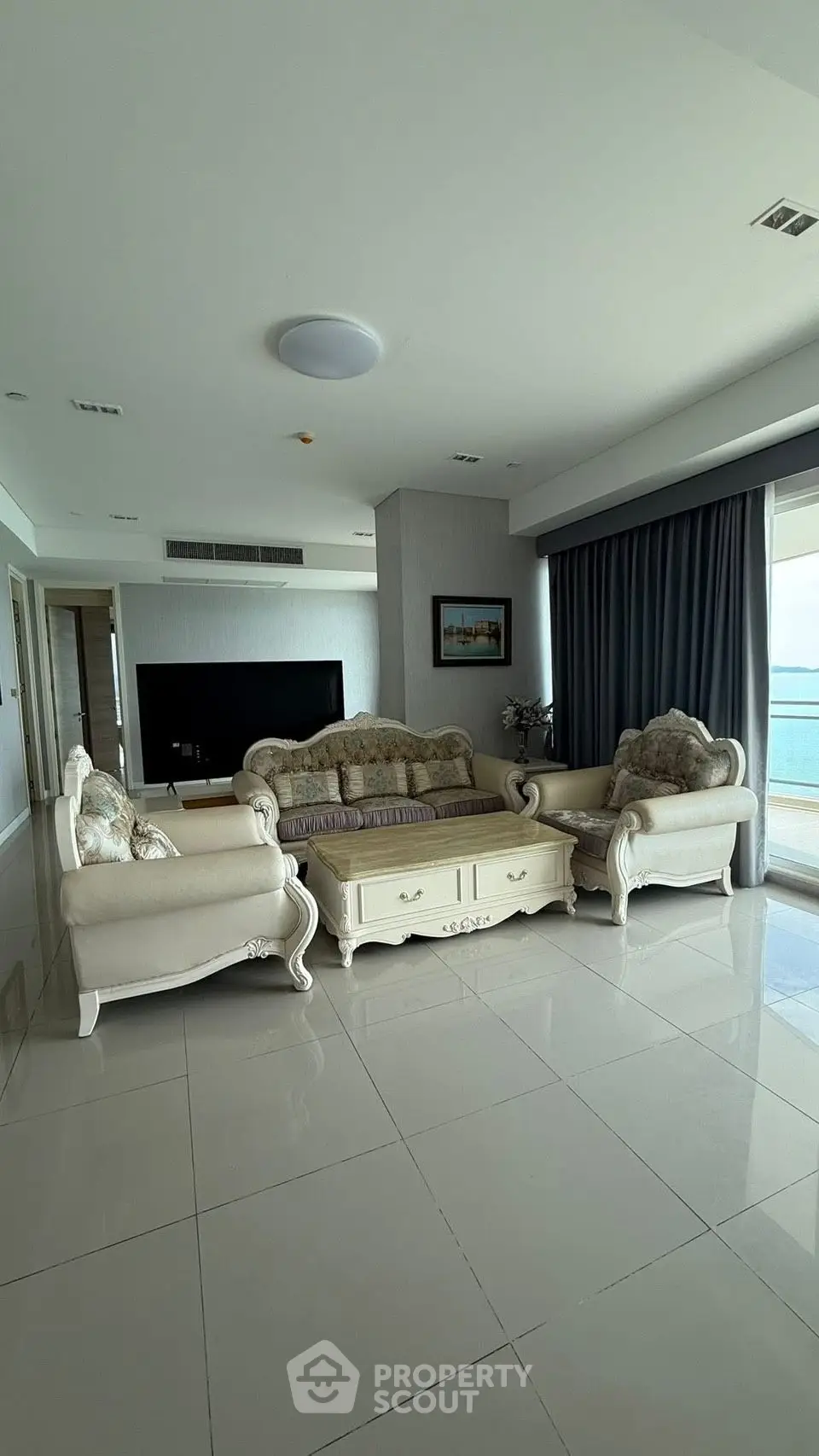 Luxurious living room with elegant furniture and stunning ocean view