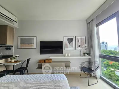 Modern bedroom with stylish decor and large window offering city view
