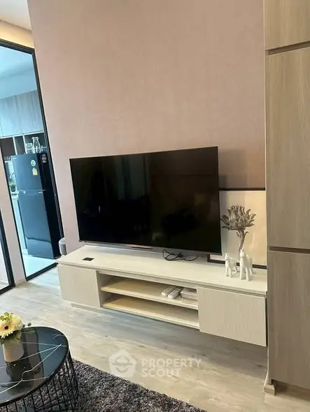 Modern living room with sleek TV setup and stylish decor