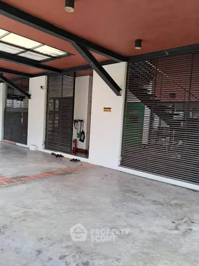 Modern building entrance with sleek design and open space