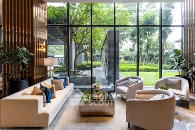 Luxurious living room with garden view and elegant furnishings