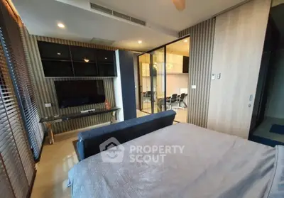 Modern bedroom with stylish decor and glass partition in luxury apartment