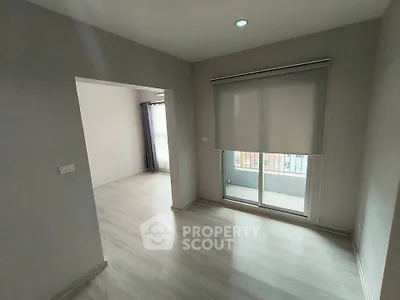 Spacious modern apartment with natural light and sleek flooring