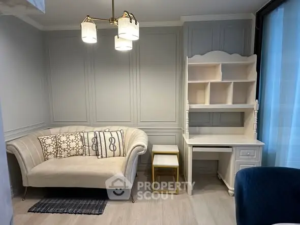 Elegant living room with stylish sofa and chic desk setup