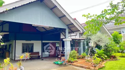 Charming suburban home with lush garden and spacious driveway, perfect for family living.