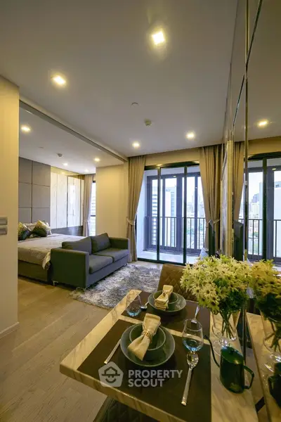 Luxurious modern living room with balcony and city view
