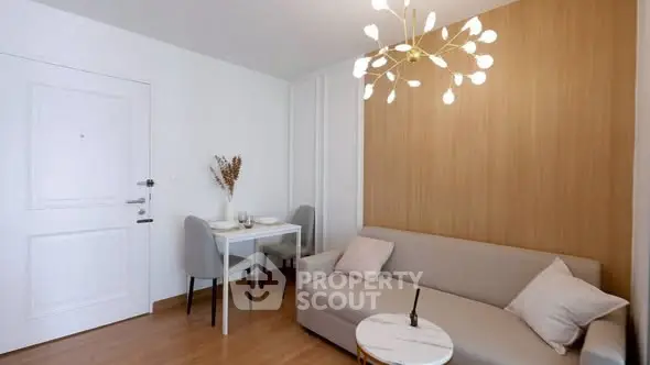 Modern living room with elegant lighting and cozy seating area