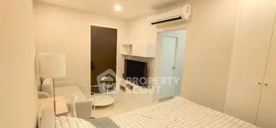 Modern bedroom with air conditioning and stylish decor