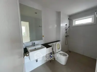 Modern bathroom with sleek fixtures and natural light
