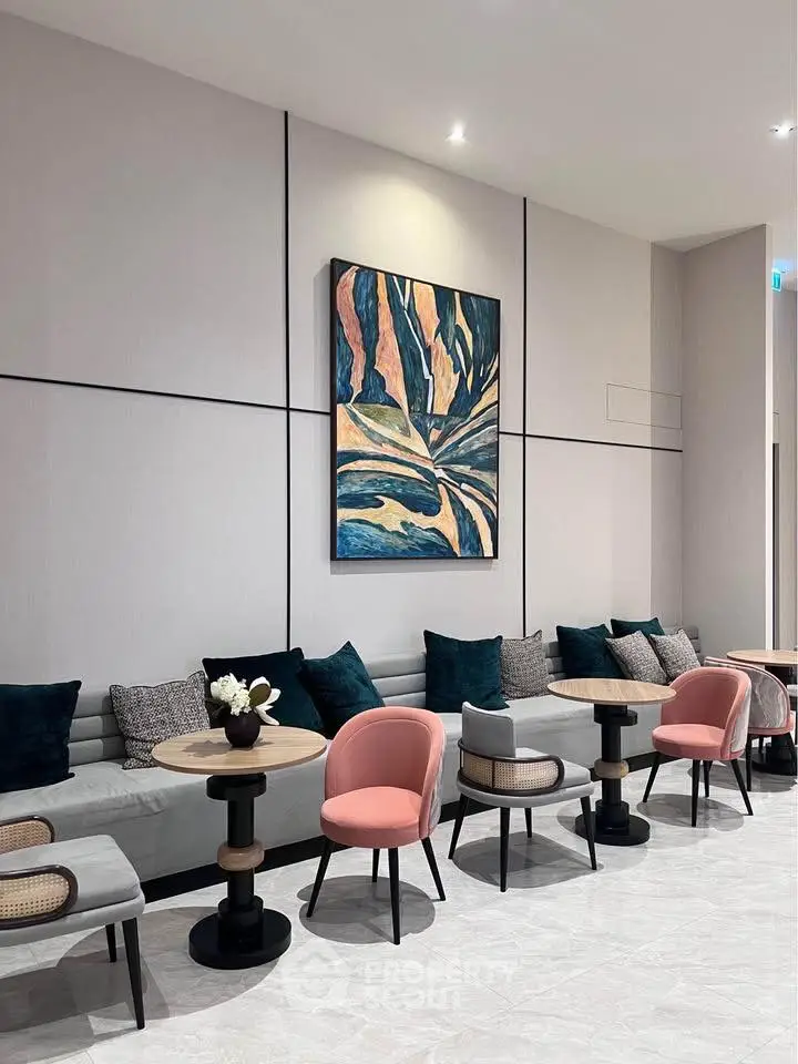 Stylish modern lobby with chic seating and contemporary art, perfect for welcoming guests in luxury.