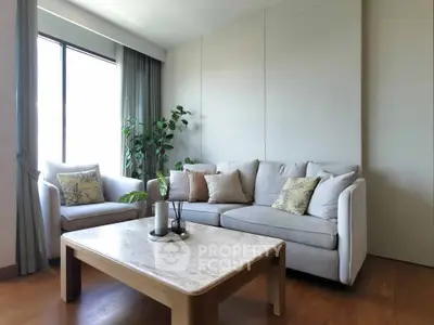 Stylish living room with modern furniture and natural light
