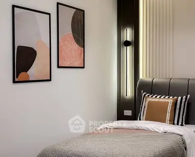 Stylish modern bedroom with elegant decor and cozy bedding