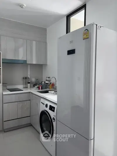 Modern kitchen with sleek appliances and minimalist design