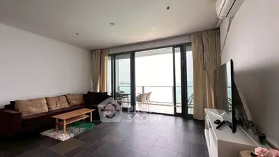 Spacious living room with large balcony and stunning sea view