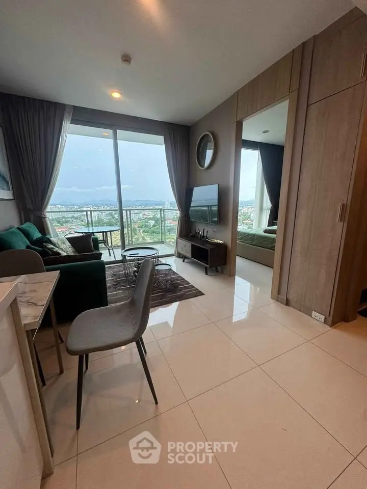 Modern living room with stunning city view and elegant decor