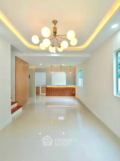 Modern living room with elegant lighting and open layout