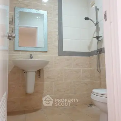 Modern bathroom with stylish tiles and sleek fixtures