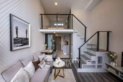 Modern loft apartment with stylish living room and mezzanine bedroom