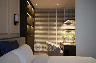 Luxurious bedroom with modern study area and elegant lighting