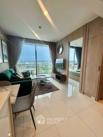 Modern living room with balcony view in high-rise apartment