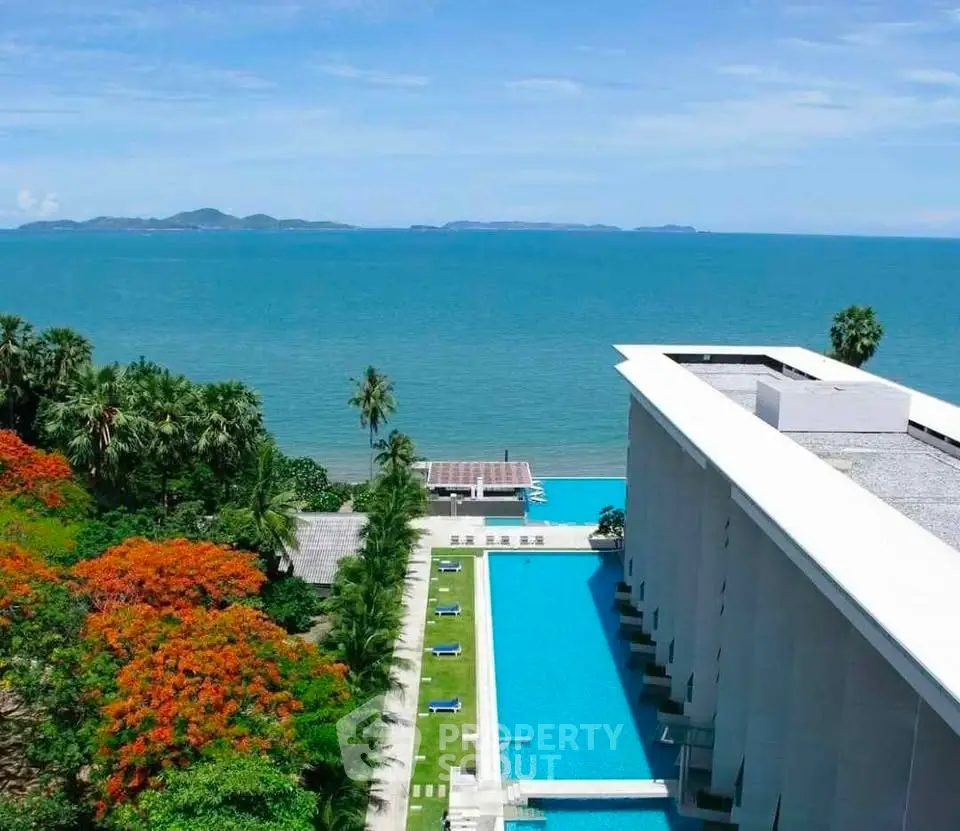 Luxurious beachfront property with stunning ocean view and infinity pool, perfect for serene living.
