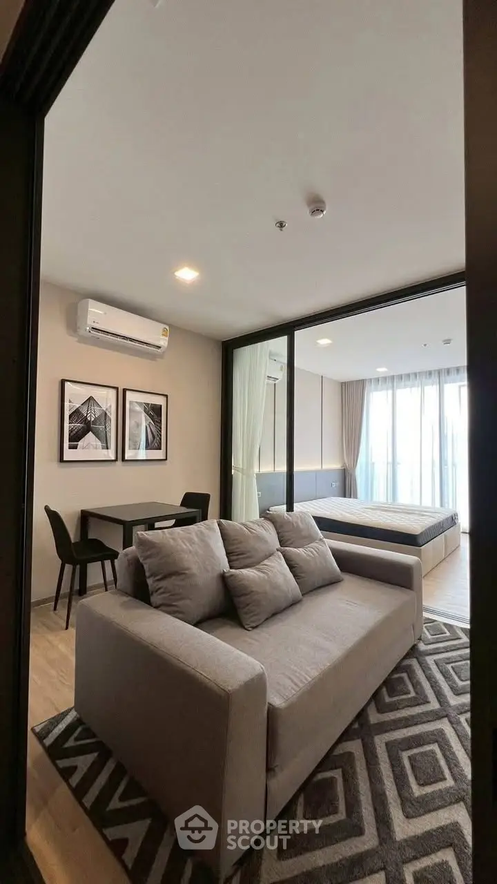 Modern studio apartment with stylish decor and cozy living area