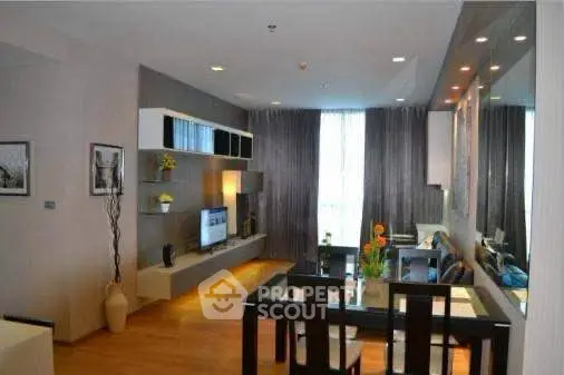 Modern living room with sleek furniture and ambient lighting