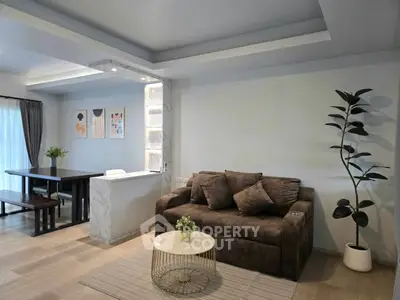 Modern living room with stylish decor and cozy seating area