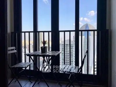 Chic urban balcony with stunning cityscape view, perfect for relaxation and enjoying the skyline.