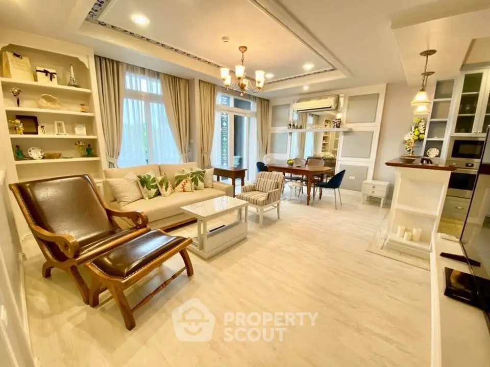 Spacious and elegant living room with modern decor and natural light